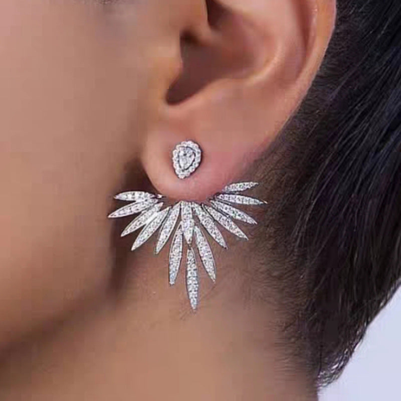 Silver angel wing earrings with zirconia