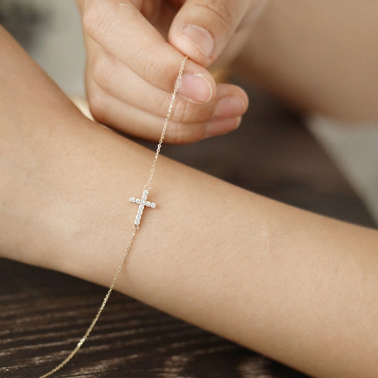 Sterling silver cross bracelet with diamonds