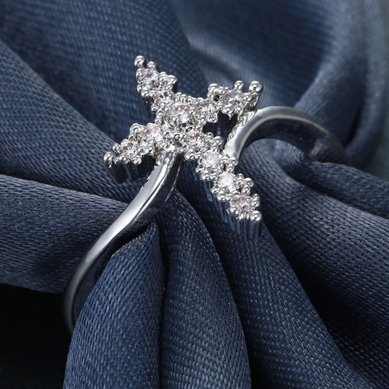 Silver cross ring with diamond accents