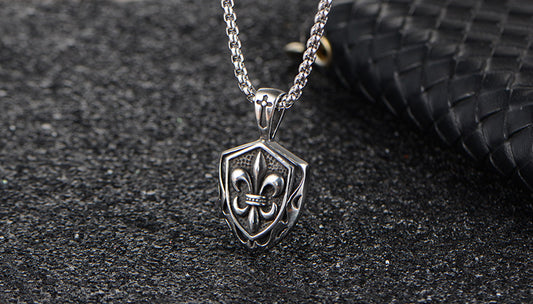 Punk rock pendant with cross and shield design