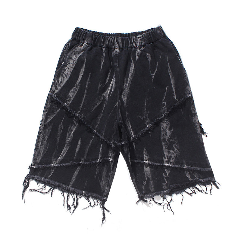 Dark tie-dye frayed denim shorts