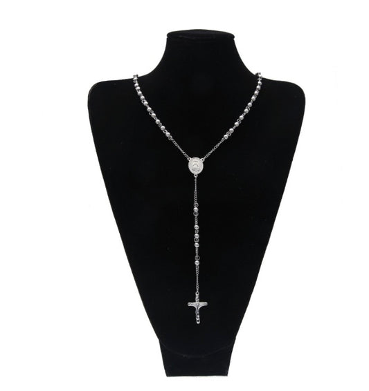 Long pendant necklace with cross and charms