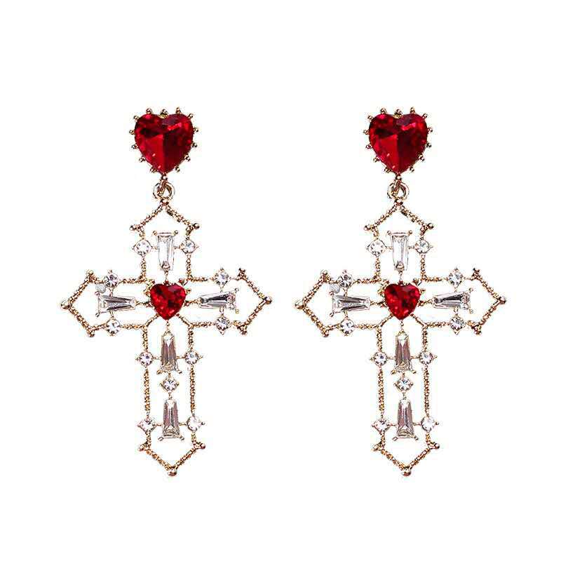 Gold cross earrings with heart design