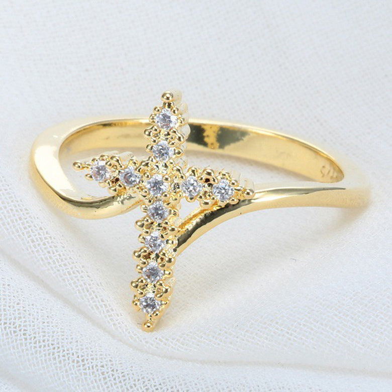 Silver cross ring with diamond accents