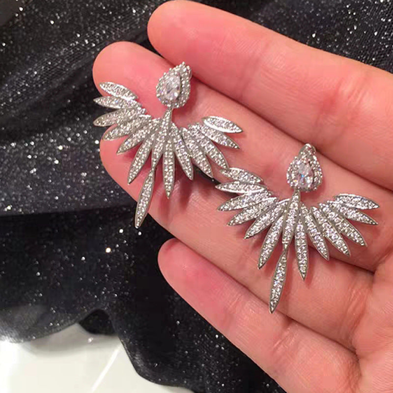 Silver angel wing earrings with zirconia