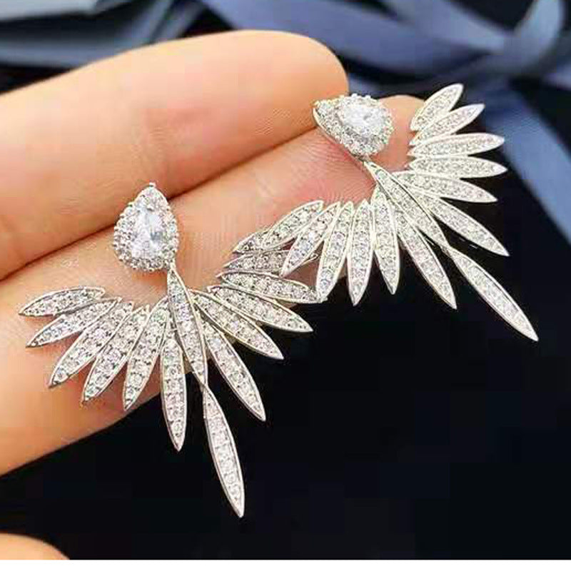 Silver angel wing earrings with zirconia